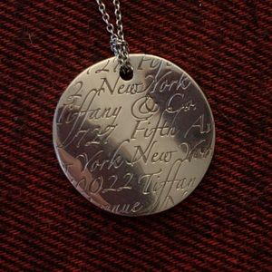 Tiffany’s Written Circle Pendant